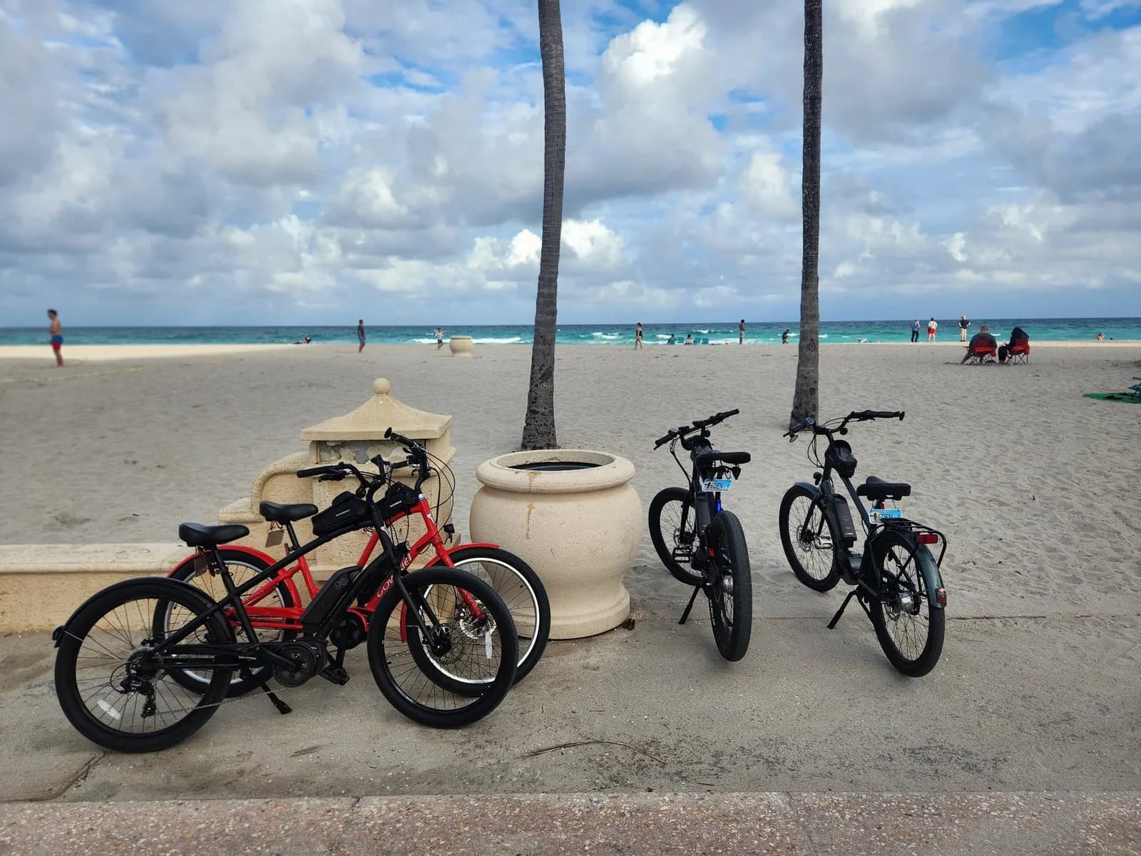 Rider enjoying an Eden e-bike on Hollywood Beach boardwalk